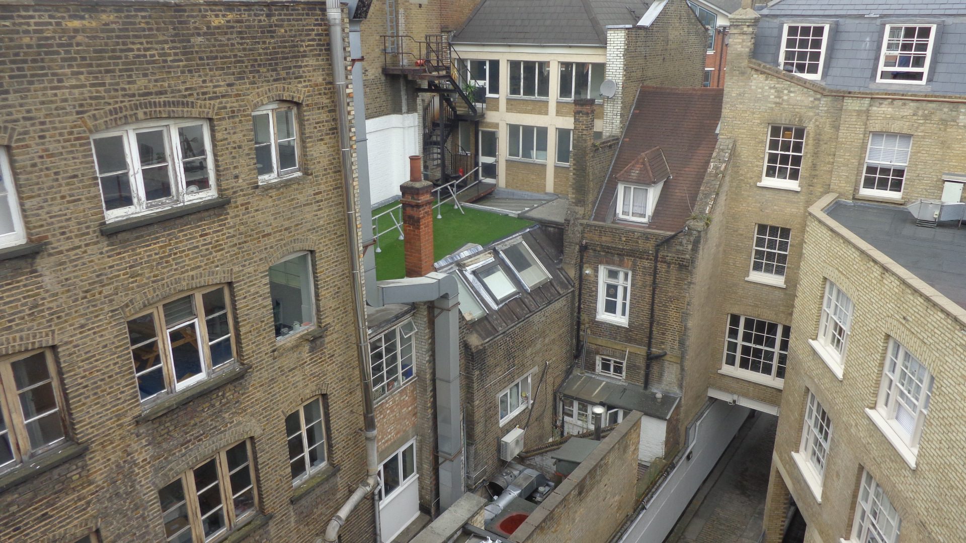 Before an office refurbishment in London showing a two-storey glass extension