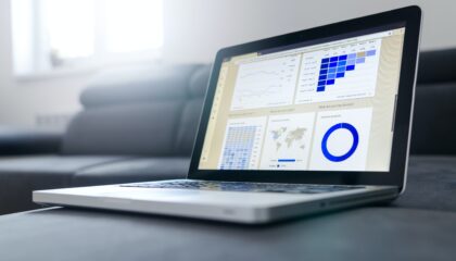 laptop showing data and graphs
