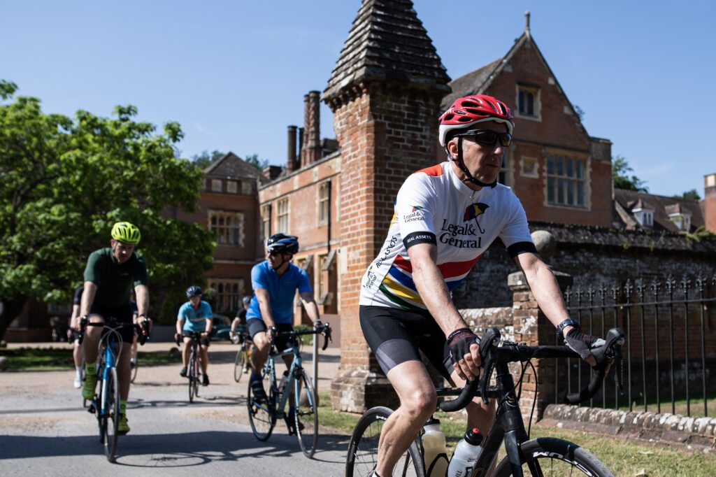 Workman and client on bikes